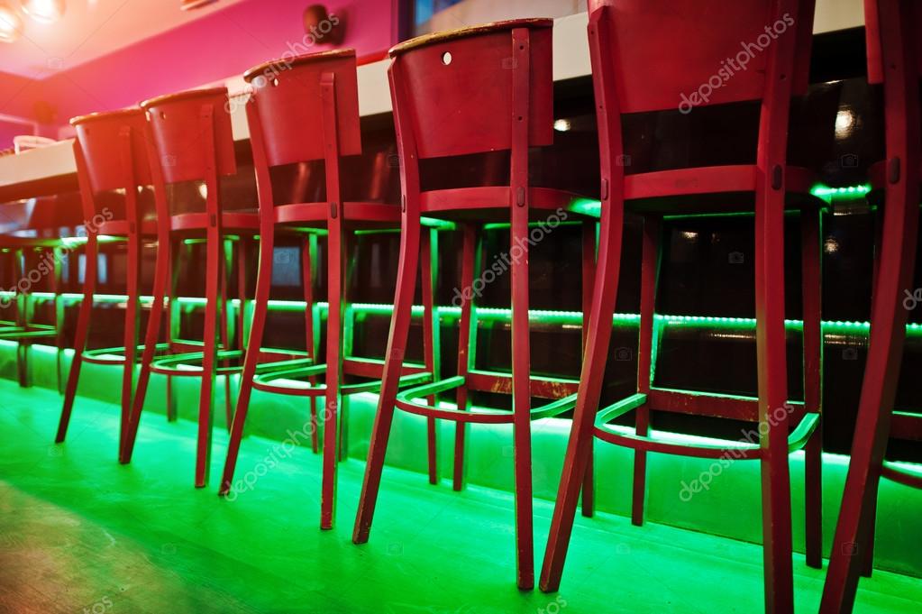 Red bar stools at diode color light Stock Photo by ©ASphoto777 102171104