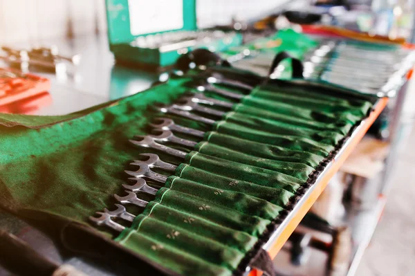 Metal rack with set of wrench spanners tools