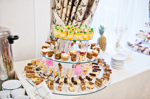 Wedding reception, table of cakes and sweet — Stock Photo, Image