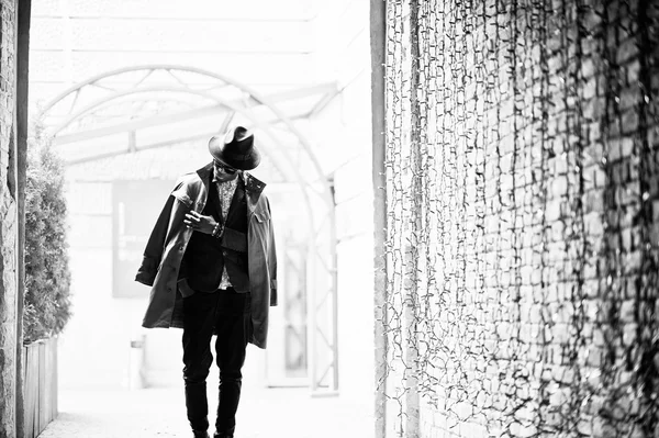 Fashion portrait of black african american man on green velvet j — Stock Photo, Image