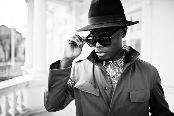 Fashion portrait of black african american man on green coat clo — Stock Photo, Image