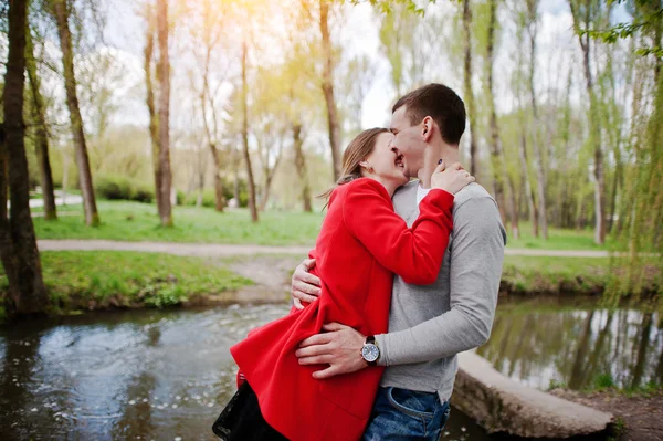 Hugging and kissed couple in love on the move — Stock Photo, Image