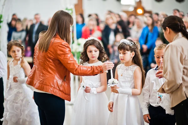 LVIV, UKRAINE - MAY 8, 2016: The ceremony of a First Communion i — Stock Photo, Image