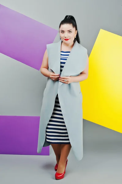 Young woman portrait with blank yellow and purple banner, board — Stock Photo, Image