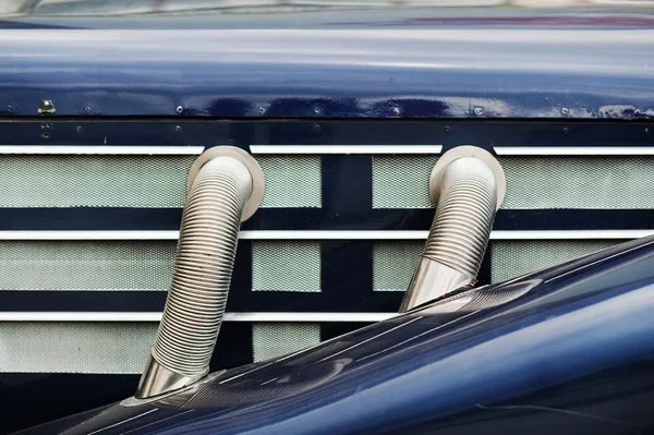 Side exhaust pipes on old classic car — Stock Photo, Image