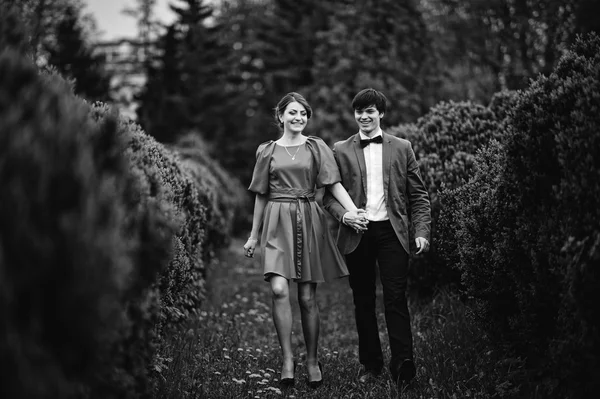 Happy and smiled couple walking in love at park garden. Stylish — Stock Photo, Image