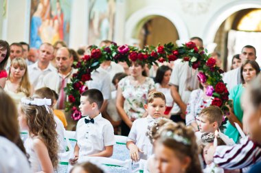 Mukyluntsi, Ukrayna - 26 Haziran, 2016: ilk Komünyon. 