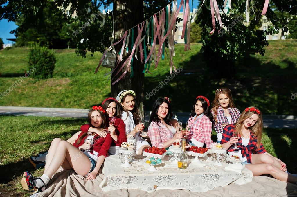 Picnic Table Costumes Seven Happy And Sexy Girls Sitting At Picnic