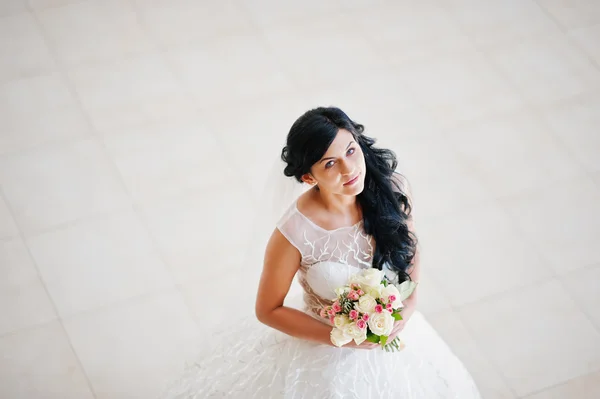 Temptation model brunette bride at exciting wedding dress with w — Stock Photo, Image