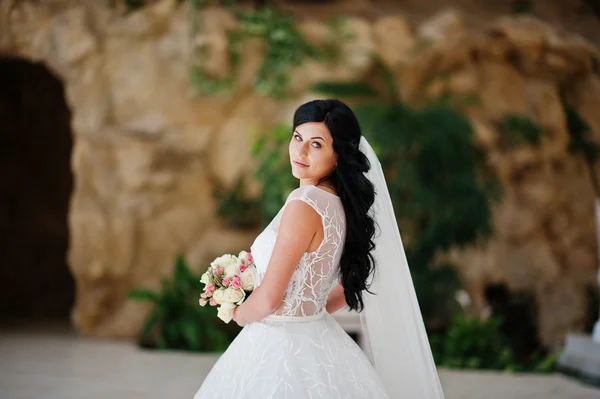 Temptation model brunette bride at exciting wedding dress — Stock Photo, Image