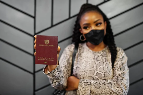 African American Woman Wearing Black Face Mask Show Colombia Passport — Stock Photo, Image