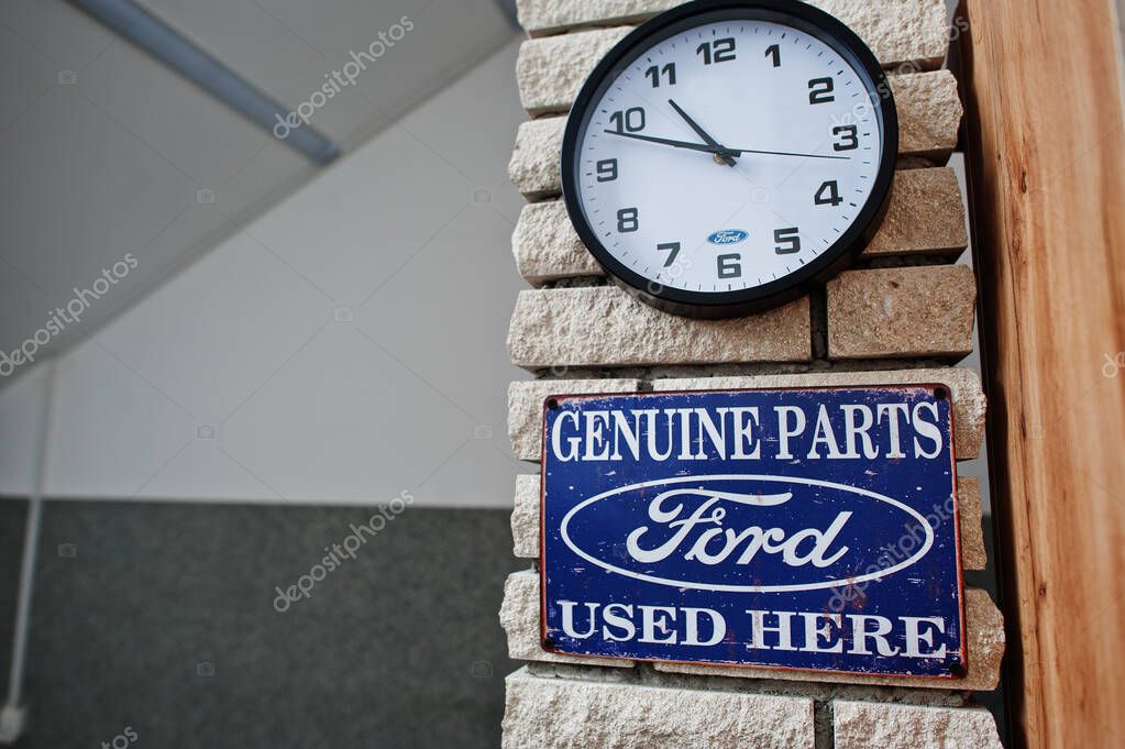 Kyiv, Ukraine - May 14, 2021:  Ford genuine parts used here vintage sign.