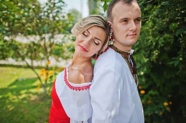 Wedding beautiful couple in traditional dress — Stock Photo, Image