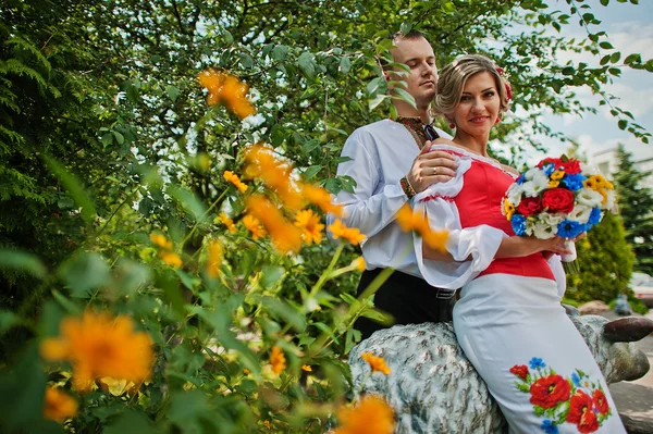 Wedding beautiful couple in traditional dress — Stock Photo, Image