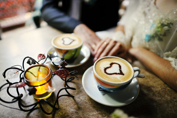 wedding couple and cup of coffee
