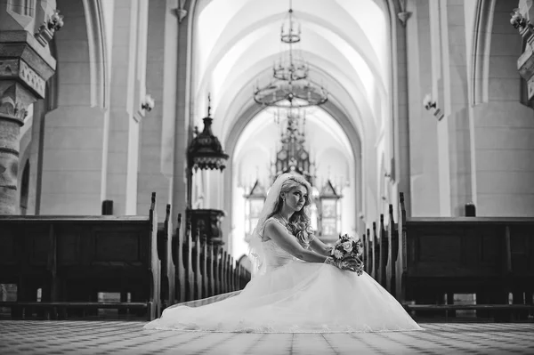 Cute blonde bride at the church — Stock Photo, Image