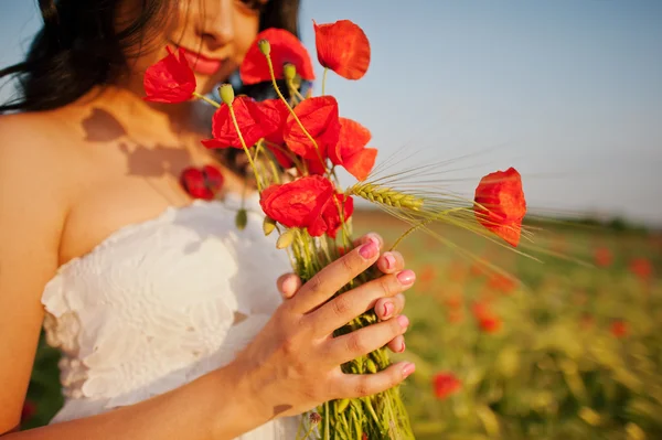 Pregnant gorgeous brunette woman on the field with wheat and pop — Stock Photo, Image