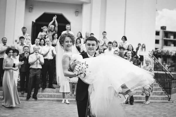 Happy newlyweds after church registration — Stock Photo, Image