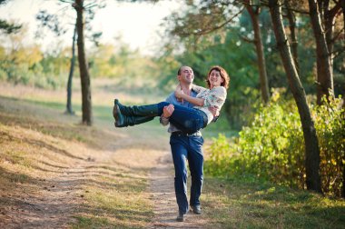 Happy and positive couple in autumn love story
