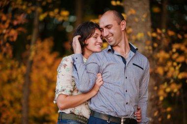 Happy and positive couple in autumn love story