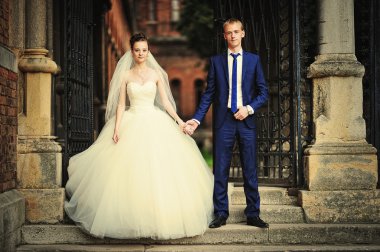 wedding couple near old vintage building