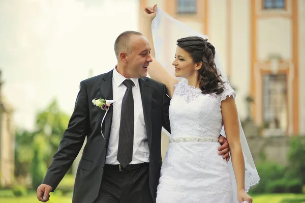 Wedding  adult couple in the courtyard of castle — Stock Photo, Image