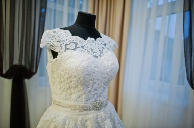 white chic wedding dress on the mannequin