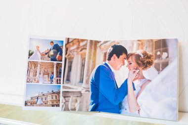 Classic white leather wedding photobook and album