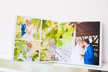 Classic white leather wedding photobook and album
