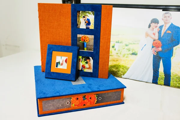 Blauwe en oranje textiel bruiloft fotoboek en album — Stockfoto