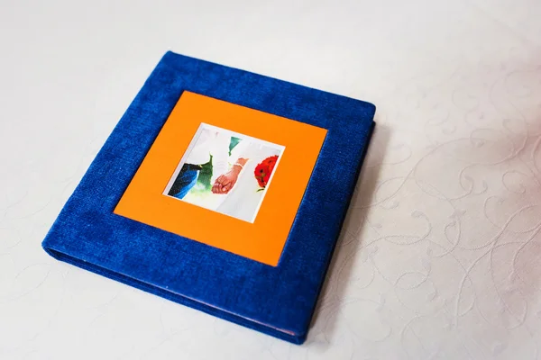Blaue und orangefarbene Textil-Hochzeitsblitzbox — Stockfoto