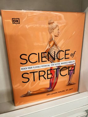 Londra, İngiltere - 12 Aralık 2025: Parlak turuncu kapak esneme figürü ve cesur başlık Dr. Leada Malek, PT DPT.