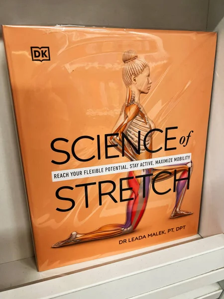 Londra, İngiltere - 12 Aralık 2025: Parlak turuncu kapak esneme figürü ve cesur başlık Dr. Leada Malek, PT DPT.