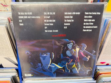 Manchester, İngiltere - 21 Ocak 2026: Cowboy Bebop 'un arka kapak çalışması, canlı animasyon karakterlerinin yer aldığı Seatbelts' in film müziği.