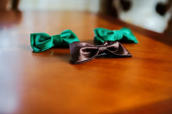 Green and brown bow ties — Stock Photo, Image