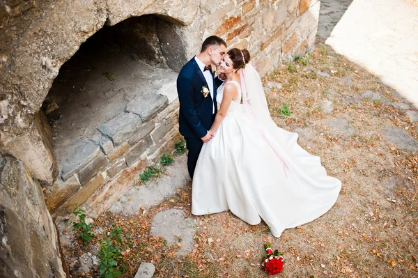 Gorgeous wedding couple at autumn park in love — Stock Photo, Image