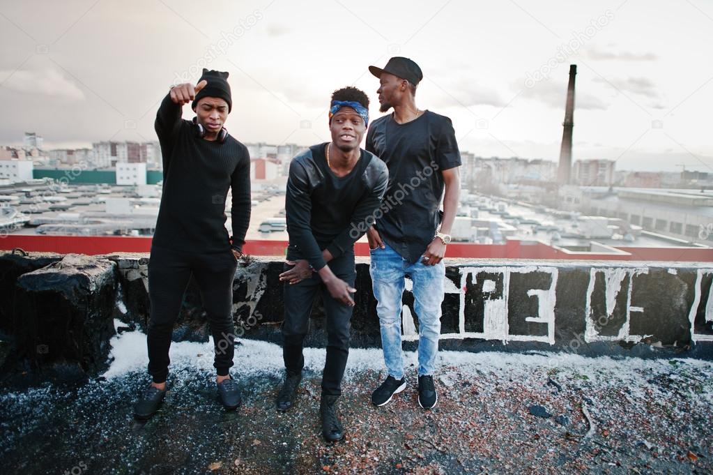 Three rap singers band on the roof