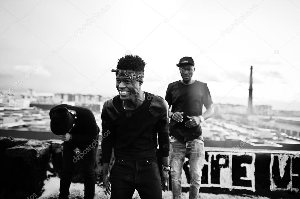 Three rap singers band on the roof