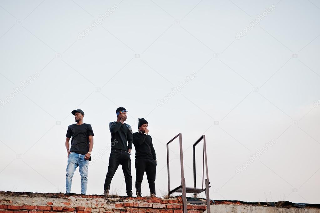 Three rap singers band on the roof