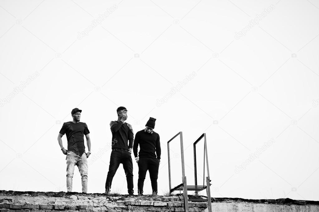 Three rap singers band on the roof