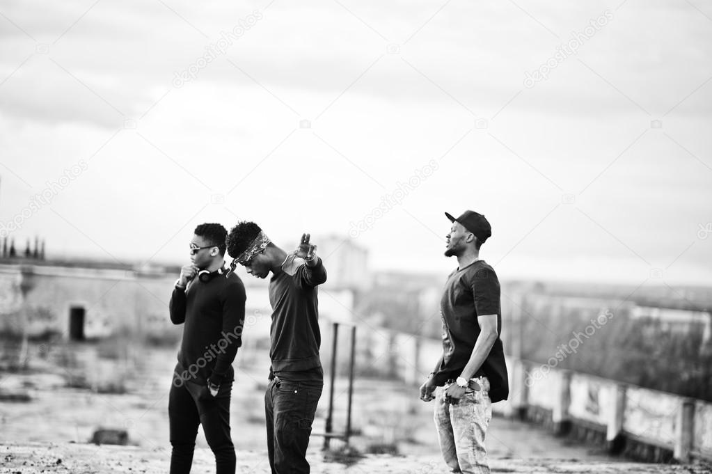 Three rap singers band on the roof