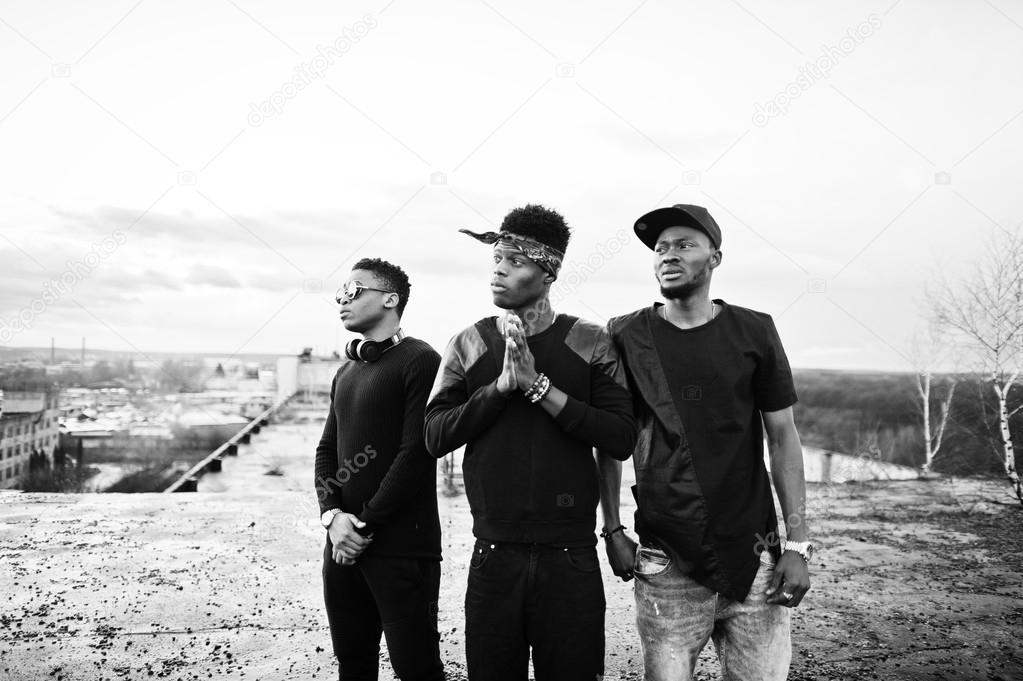 Three rap singers band on the roof