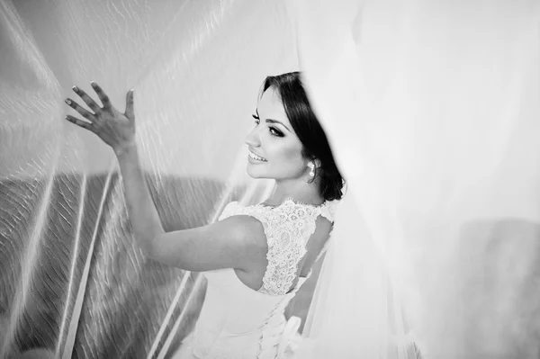 Bride posed at her wedding day in curtains — Stock Photo, Image