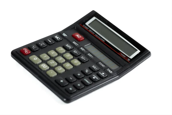 Black calculator isolated on white background. Close up.