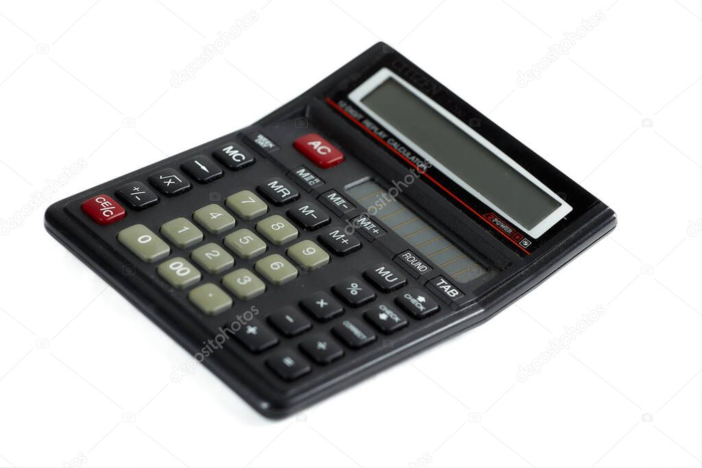 Black calculator isolated on white background. Close up.