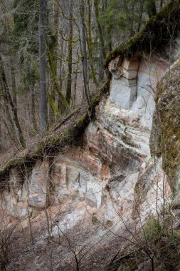 The semi-circular funnel-shaped ravine of the Dauda River is called the witch's cauldron. Wonderful nature view in the Gauja National Park.