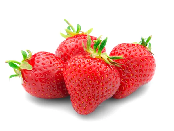 一些草莓孤立在白色背景上的叶子. 免版税图库图片