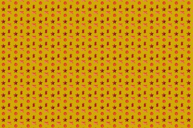 Noel motifleri, yaylar, yıldızlar, ren geyikleri ve meleklerle desen