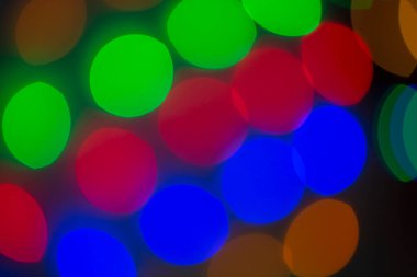 Bulanık bokeh ışığı arka plan, gece şehrinde parlayan ve parlayan ışıklar, modern güzel parlak arka plan