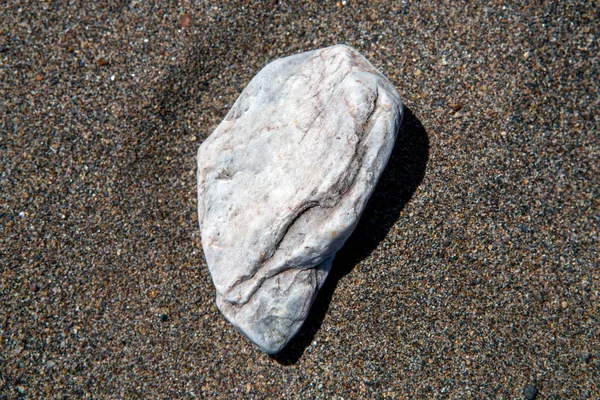 Pláž Písek Některými Kameny Close Záběr Ideální Pro Pozadí Nebo — Stock fotografie